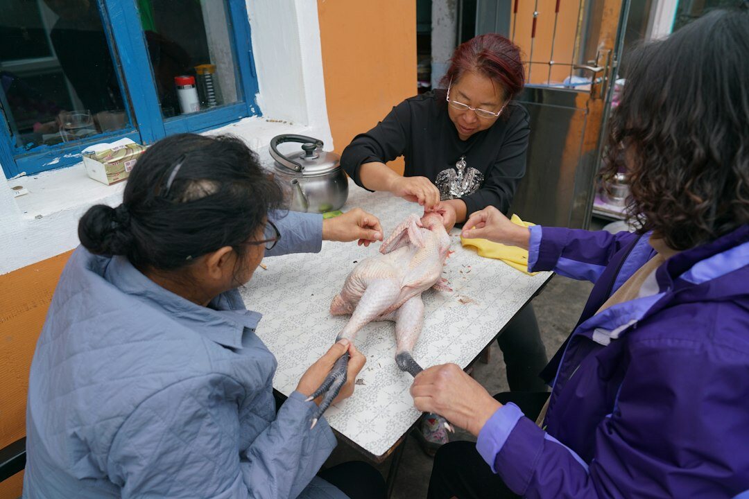 Diverse team of researchers discussing findings around a table