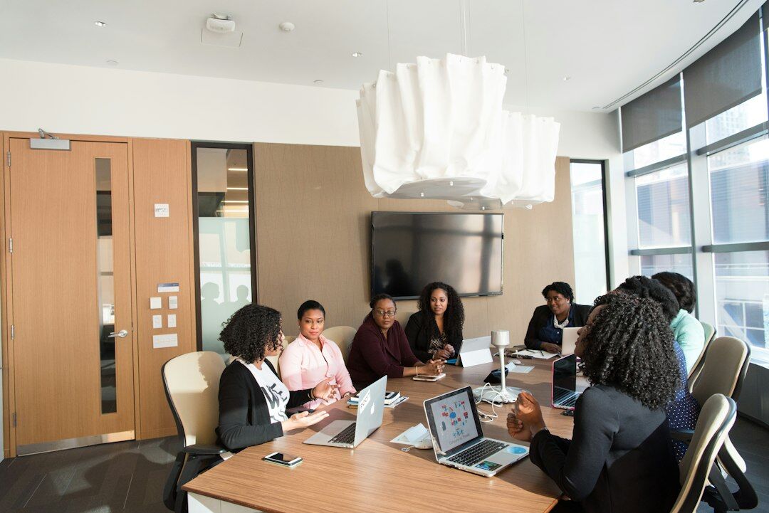 diverse group talking in meeting